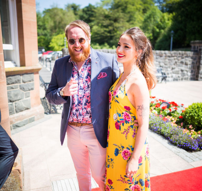 Couple outside Cultra Manor